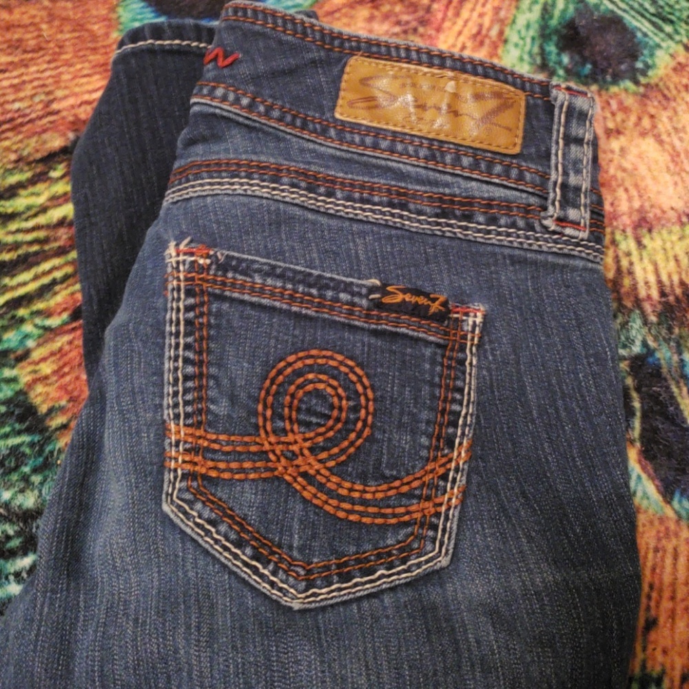 Seven 7 Jean's length about 30